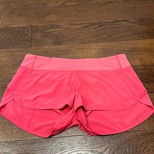 Lululemon.  Speed up, pink, women’s shorts with liner.  EUC.